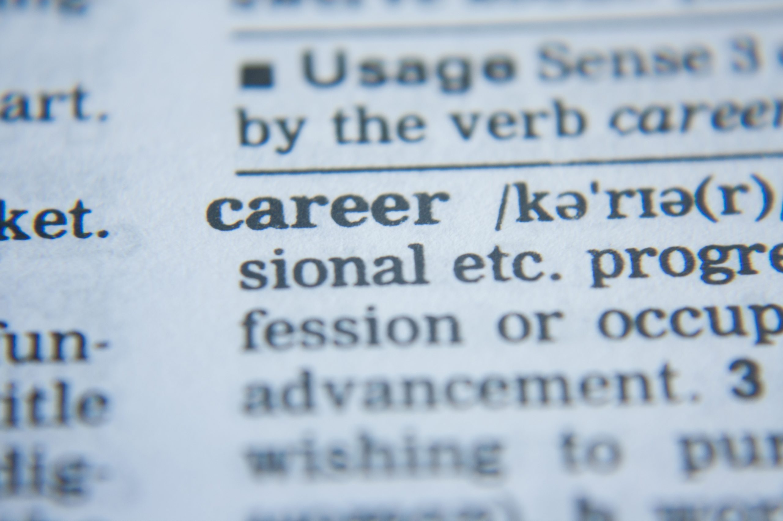 Image of lots of black text on a white piece of paper, zoomed in on the word “career”.
