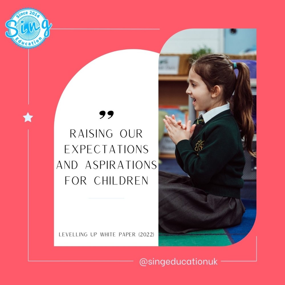 A young girl in a school uniform is seated on the floor, clapping her hands with a joyful expression, illustrating the impact of educational enrichment. The accompanying text emphasizes the commitment to elevating children's expectations and aspirations, reflecting Sing Education's ethos as highlighted in the "Levelling Up White Paper (2022)." The design elements and quote underscore the organization's focus on enhancing educational experiences.