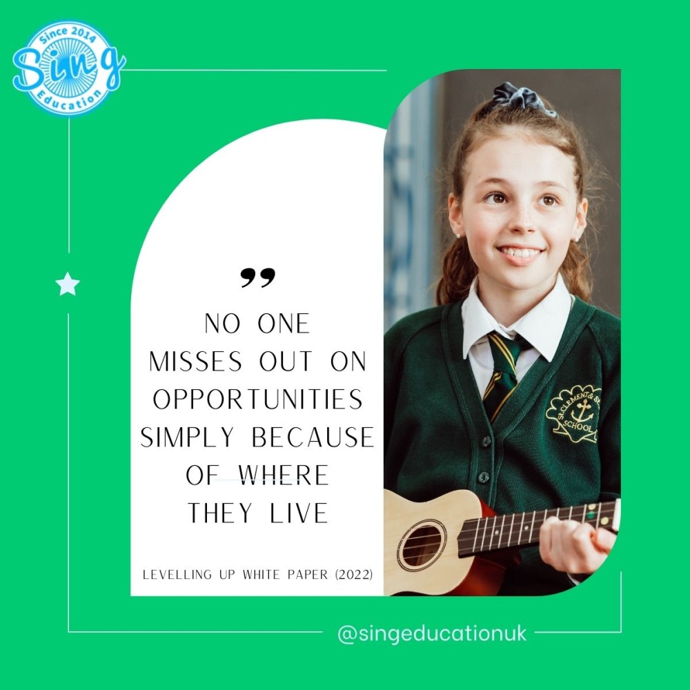 A smiling young student in a green school uniform proudly holds a ukulele, embodying the spirit of inclusivity and equal access to music education as highlighted by the quote "No one misses out on opportunities simply because of where they live" from the Levelling Up White Paper (2022), reinforcing Sing Education's commitment to fostering musical talent regardless of geographical location.