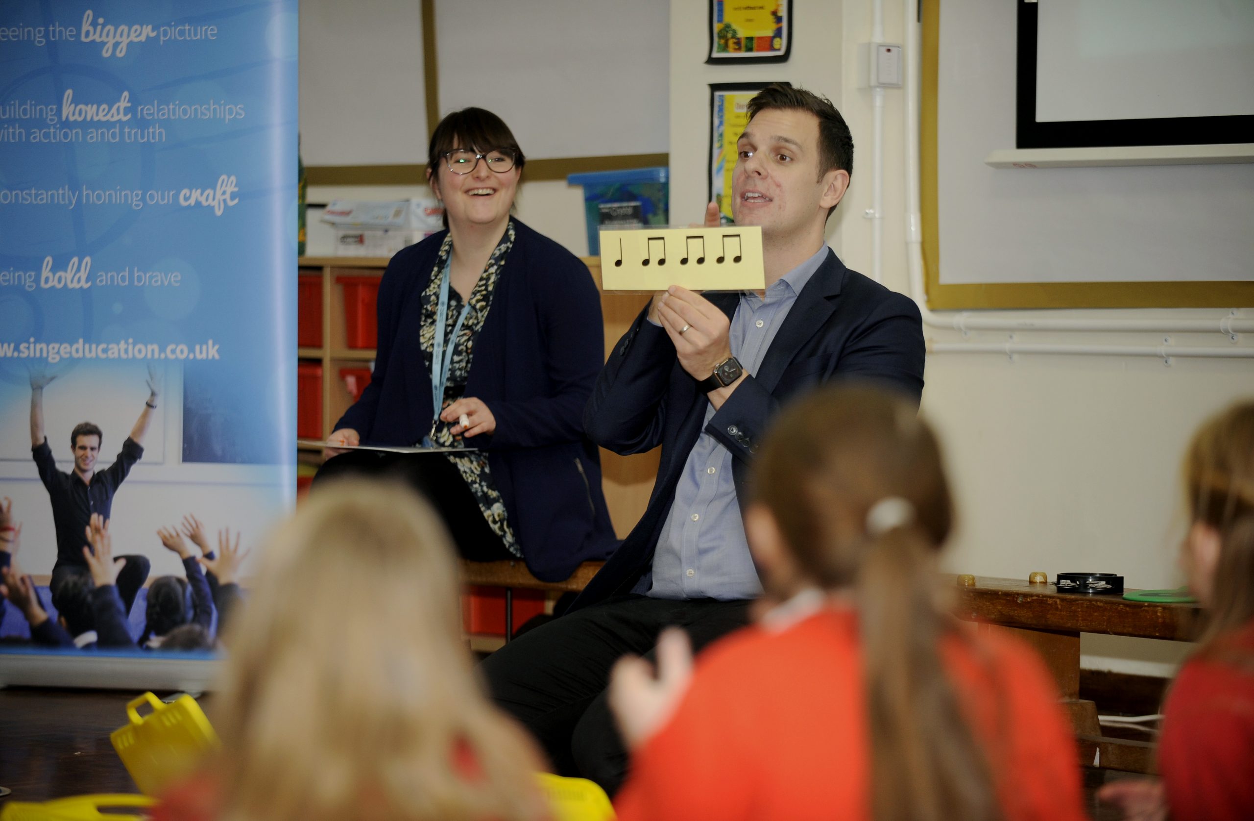 Sing Education teacher is using flashcards to teach music at St George's Primary School