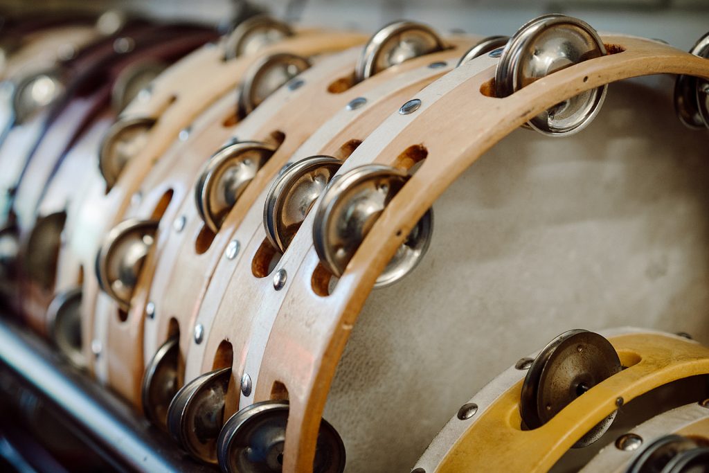 Tambourines stacked in a primary school music classroom