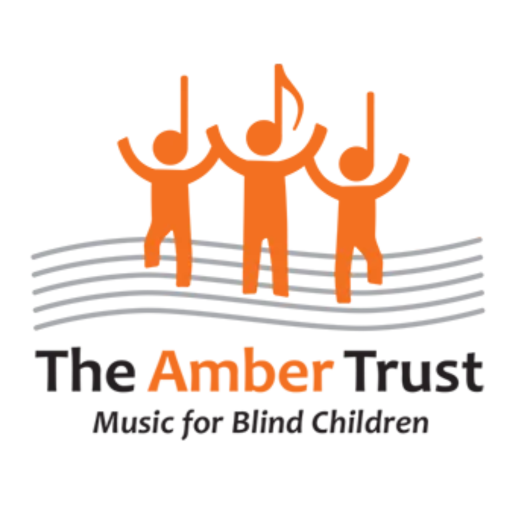 The image features a logo with three stylized orange figures, each with a musical note for a head, standing with arms raised on a set of black music staff lines. Below the figures is the text "The Amber Trust" in bold orange letters, followed by "Music for Blind Children" in smaller black letters, indicating the organization's focus on providing musical opportunities for visually impaired youth.